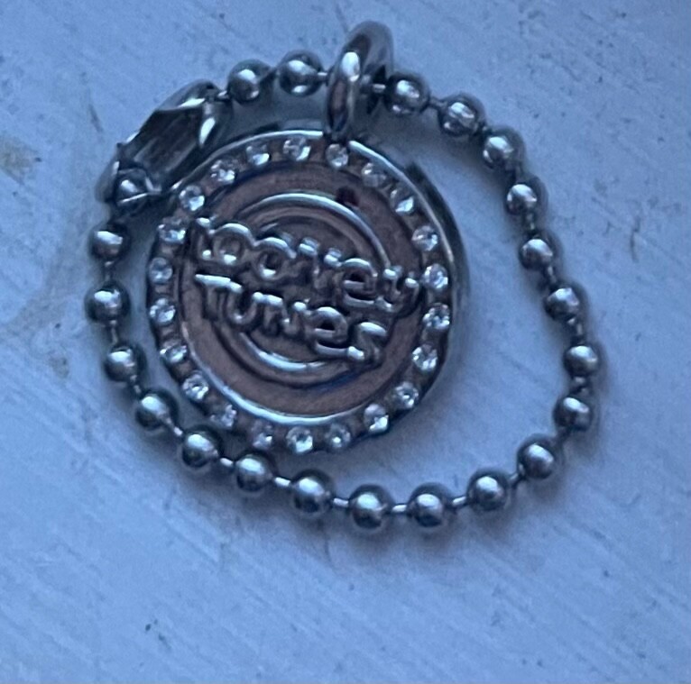 Exclusive loony tunes diamond key chain real diamonds clear and good to flex. 