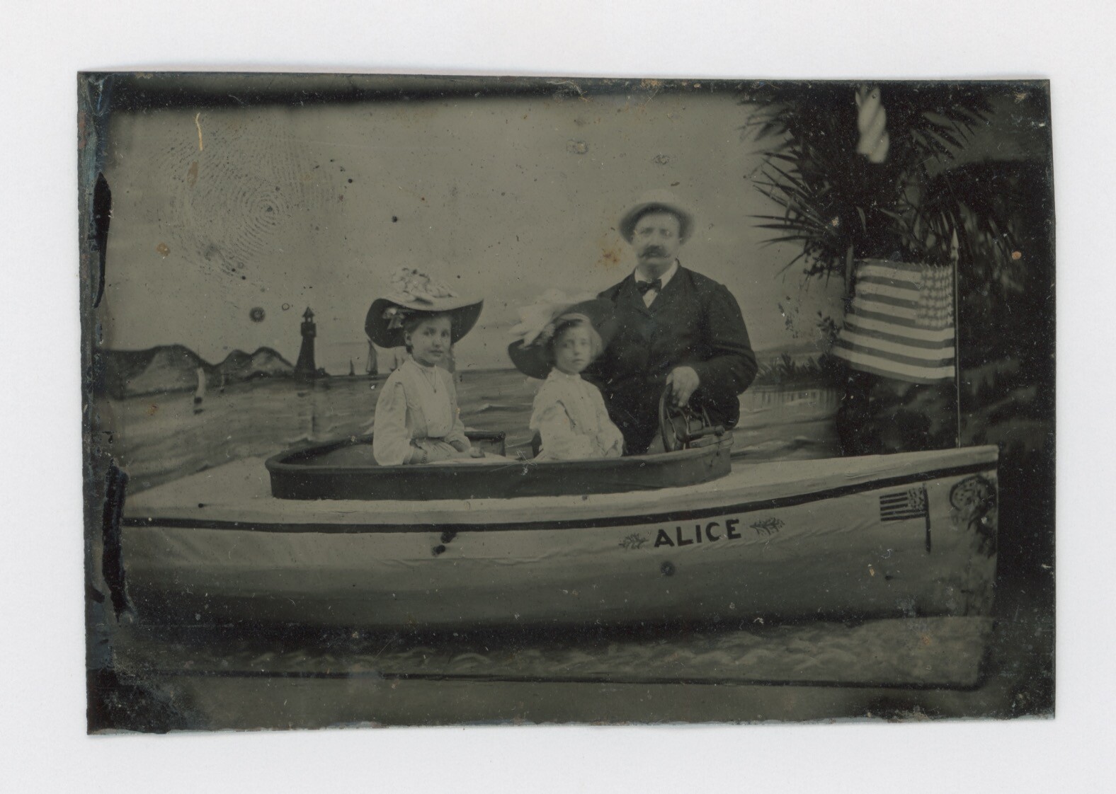 1870's-1880's TINTYPE AMERICAN FLAG FLYING & AMERICAN FLAG PAINTED ON FAUX BOAT 1870's-1880's TINTYPE AMERICAN FLAG FLYING & AMERICAN FLAG PAINTED ON FAUX BOAT