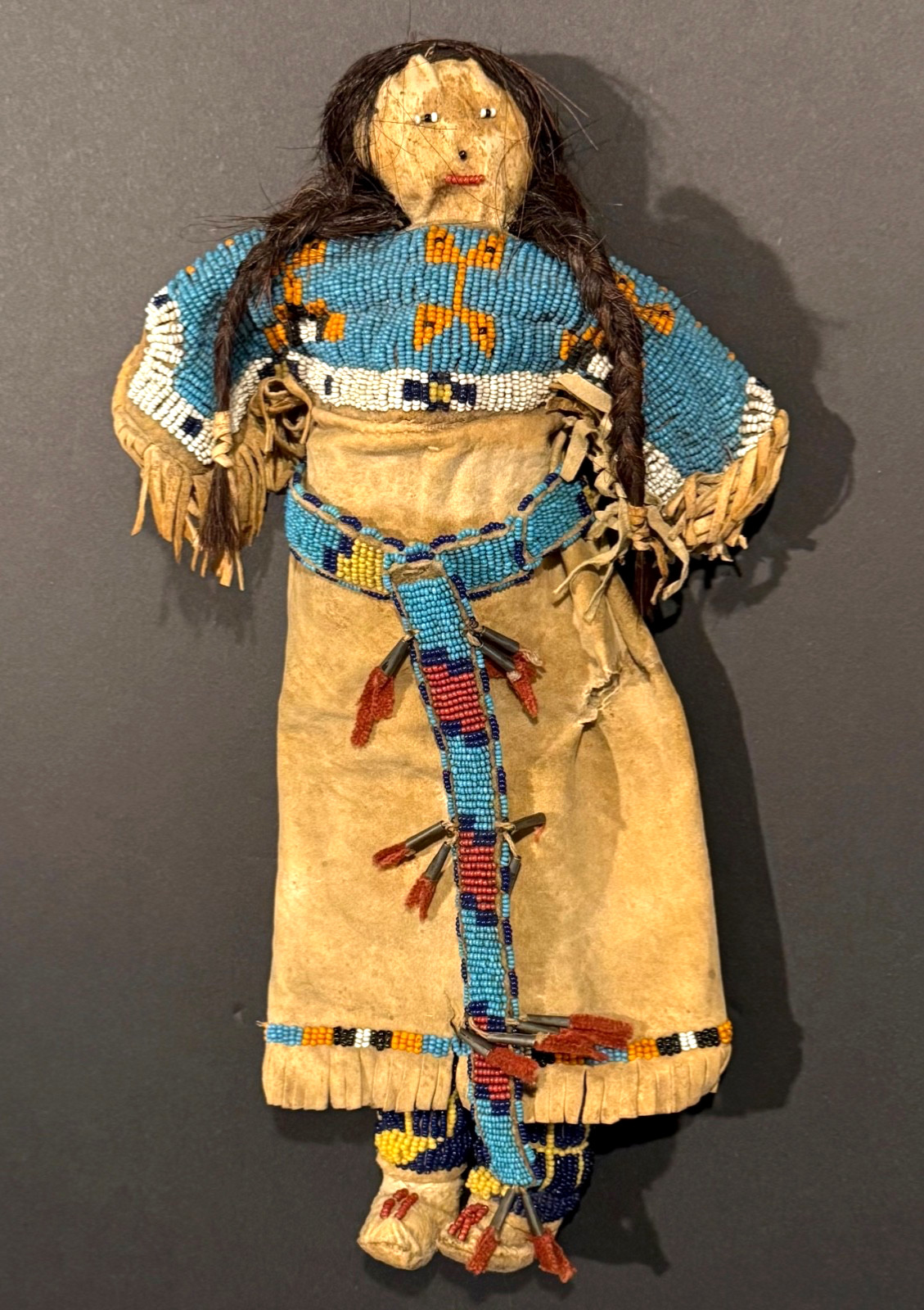 LATE 19TH C PLAINS BEADED LEATHER DOLL,ELABORATE YOKE & TIN CONE BELT, EXCELLENT LATE 19TH C PLAINS BEADED LEATHER DOLL,ELABORATE YOKE & TIN CONE BELT, EXCELLENT