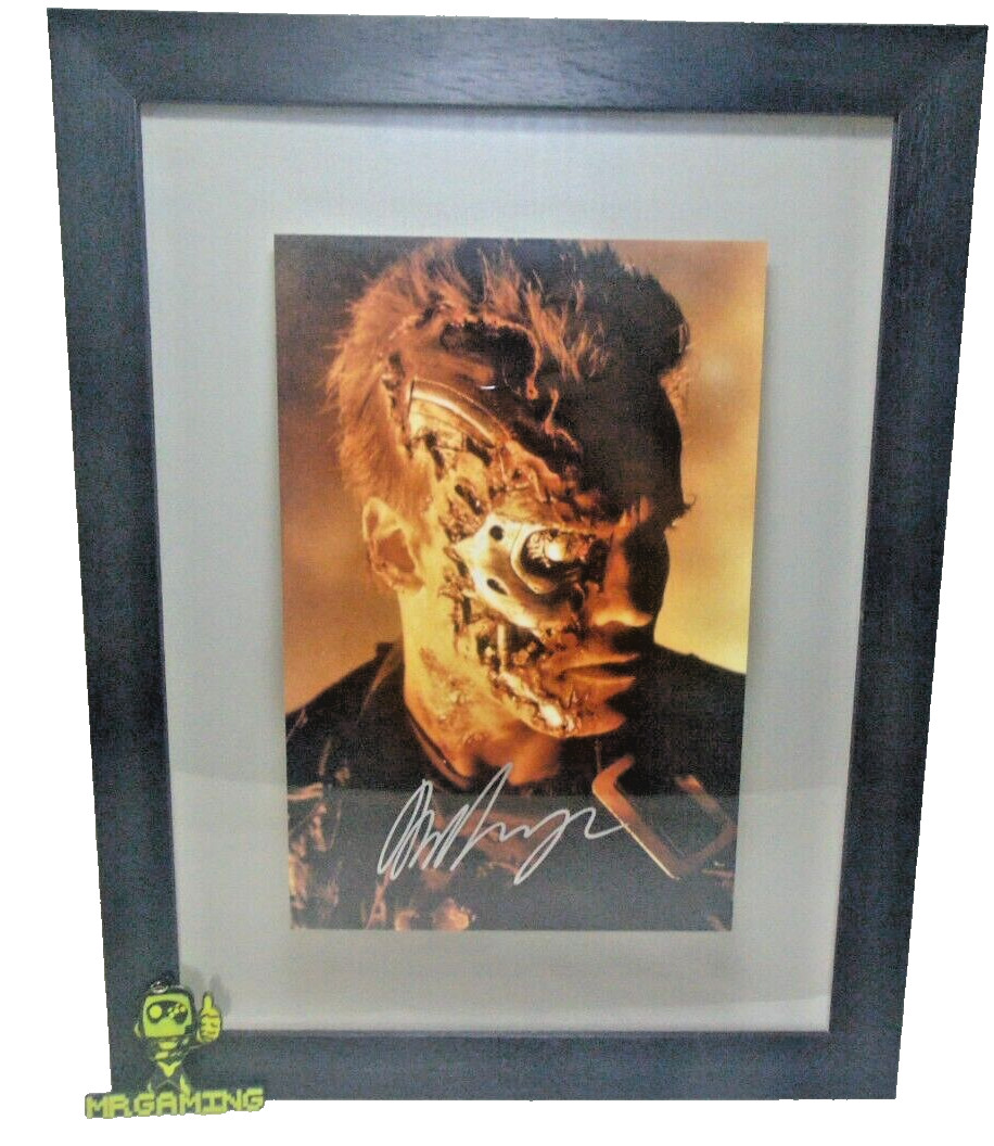 Arnold Schwarzenegger Terminator signed autographed 12x8 photo WITH COA Arnold Schwarzenegger Terminator signed autographed 12x8 photo WITH COA