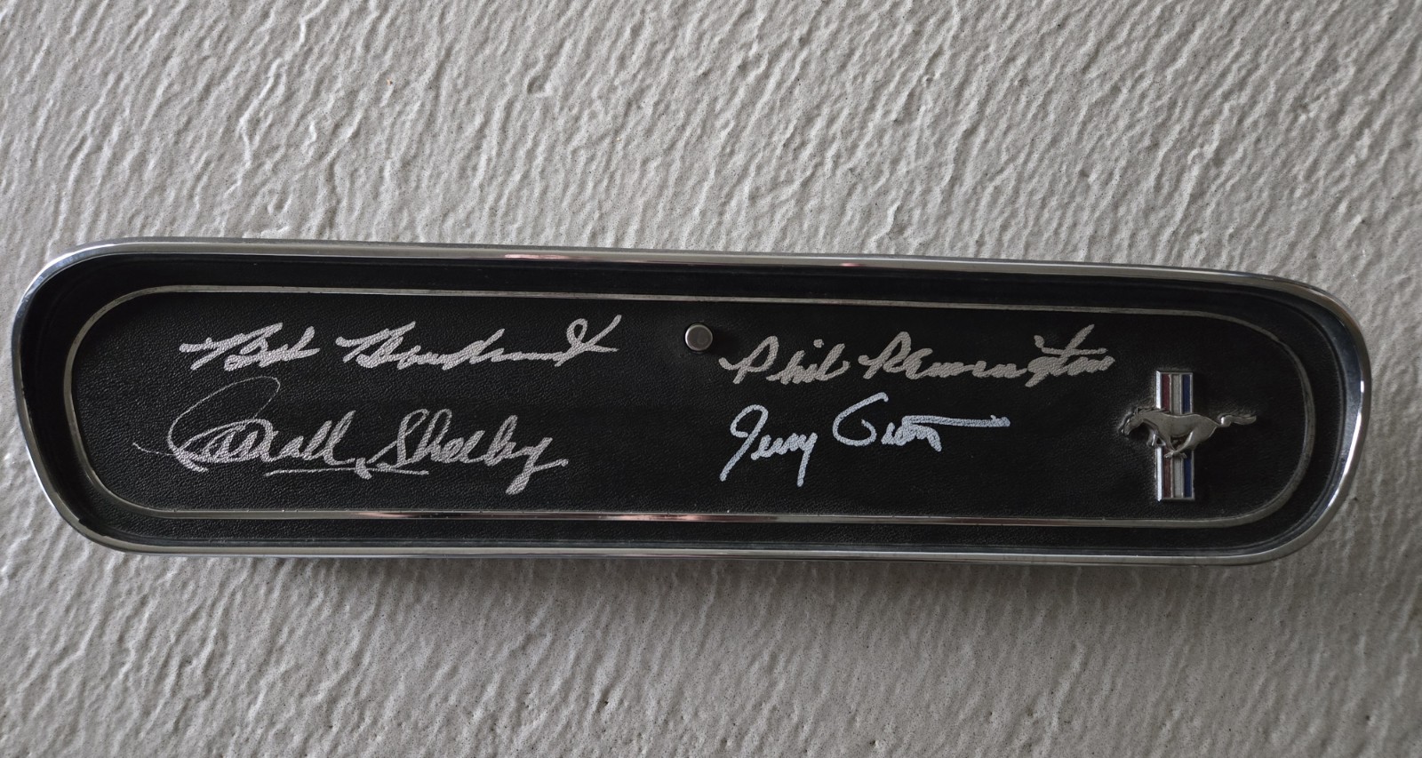 CARROLL SHELBY, Bob Bondurant, Phil Remington and Jerry Grant signed glove box 