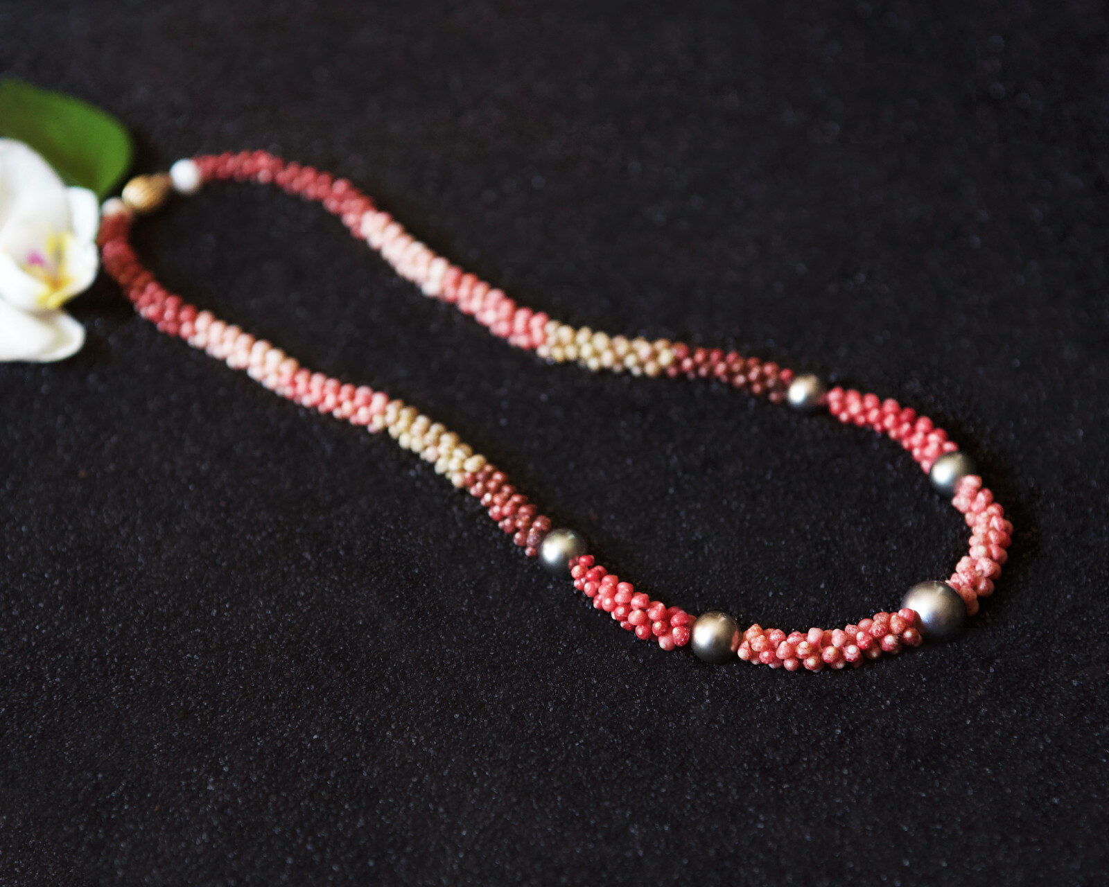 Exceptional Ni’ihau Certified Tahitian Pearl Accented Poepoe Lei Exceptional Ni’ihau Certified Tahitian Pearl Accented Poepoe Lei