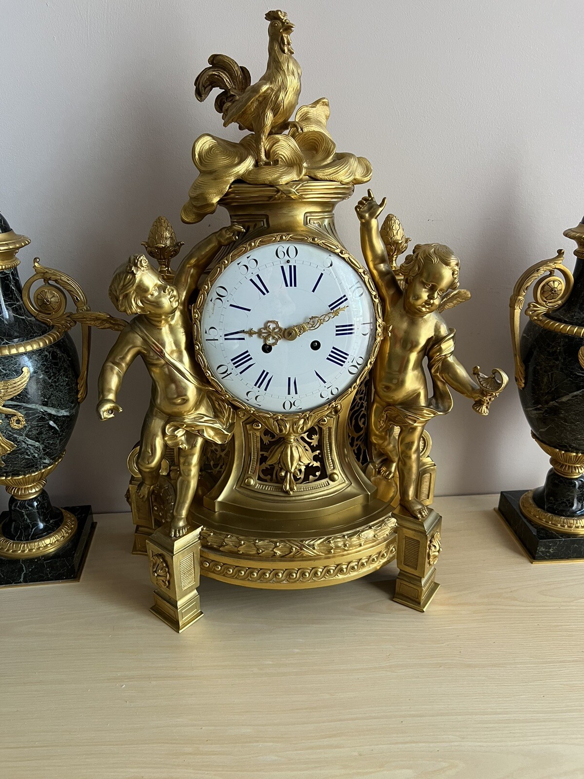 19th Century French Bronze Louis 16th Clock With Cherub And Rooster Adornment 19th Century French Bronze Louis 16th Clock With Cherub And Rooster Adornment