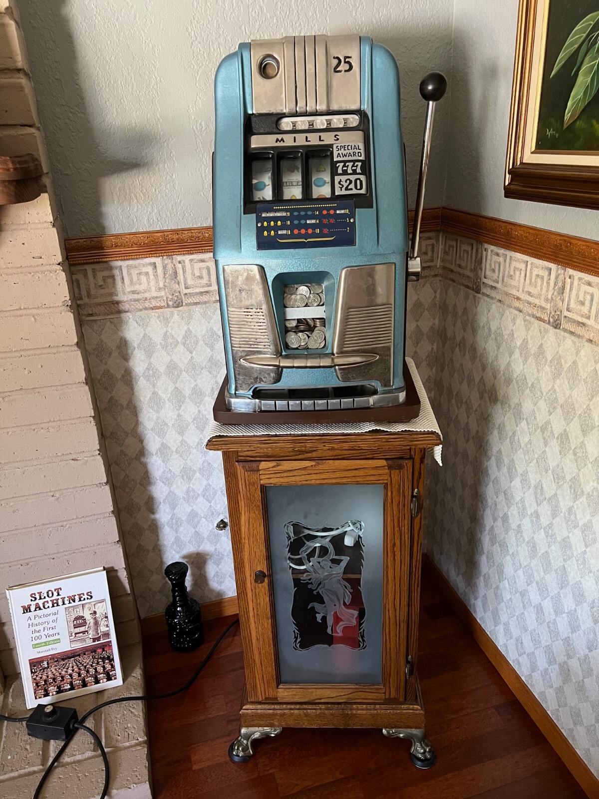 1944 Mills slot machine jackpot with oak stand
