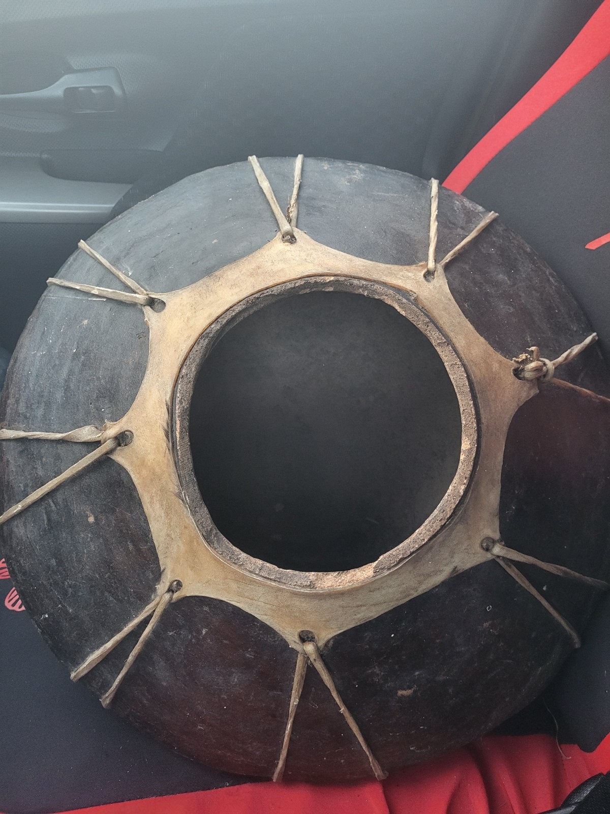 Tarahumara (Rarámuri) rawhide-bound clay pot, also known as an olla or water jug Tarahumara (Rarámuri) rawhide-bound clay pot, also known as an olla or water jug