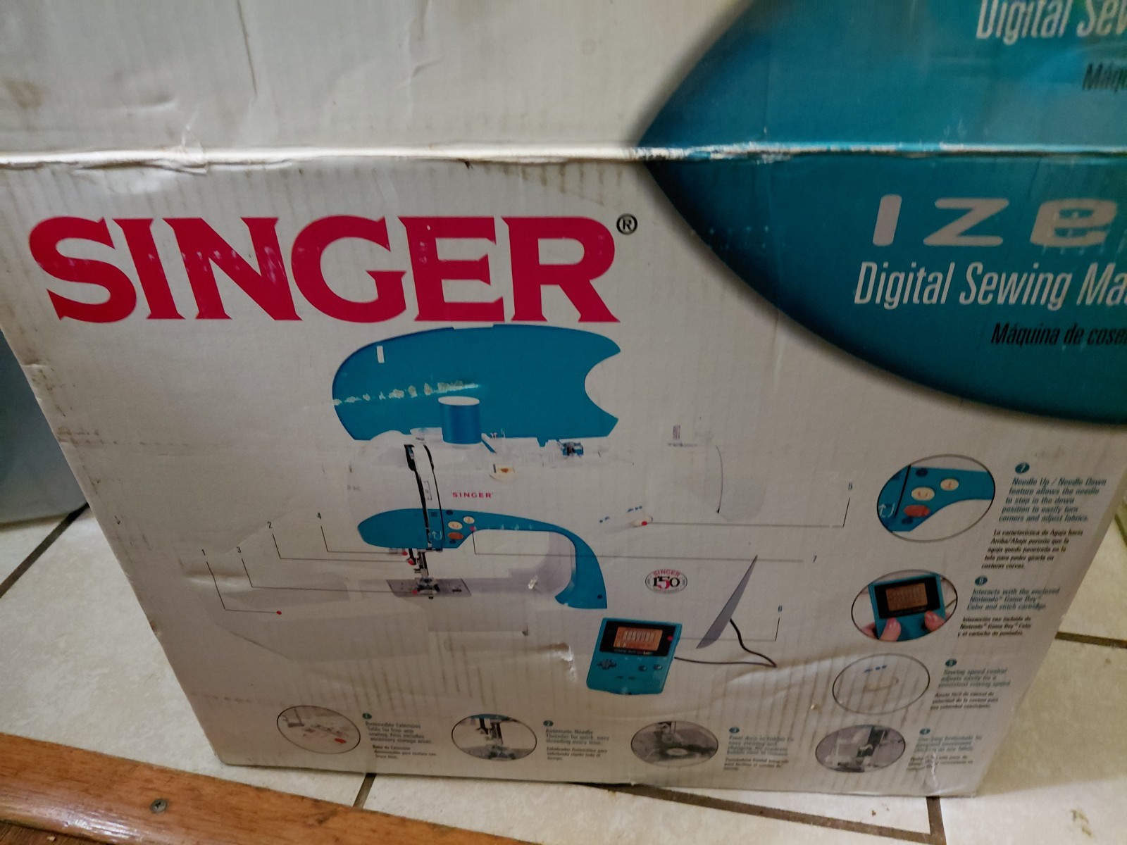 Singer Izek Model 1500 Sewing Machine w Gameboy & Cartridge - STILL IN BOX Singer Izek Model 1500 Sewing Machine w Gameboy & Cartridge - STILL IN BOX