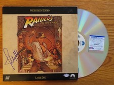 Conductor JOHN WILLIAMS signed RAIDERS OF THE LOST ARK 92 LaserDisc PSA AJ36488 picture