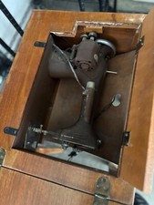 Antique Sewing Machine in original cabinet. My Grandmother's sturdy machine. picture