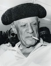 1954 Pablo Picasso Smoking in Toreador Hat at Vallauris Photo by Andre Villers picture