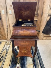 Beautiful Swan Porter music box with matching cabinet, comes with 20 discs. picture