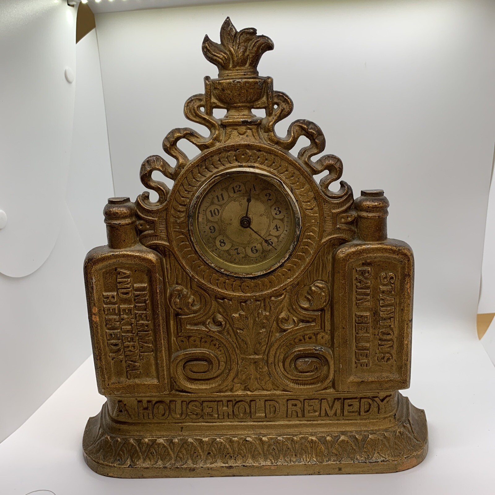 RARE Antique Stantons Pain Relief Cast Iron Clock Regent Stanton's AS IS